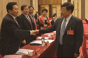 曹寶華與國務委員公安部長趙克志握手